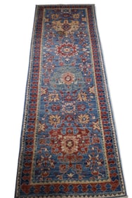 APPROX 8' x 2' 9" HANDMADE WOOL RUG