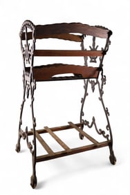 CAST IRON MAGAZINE RACK