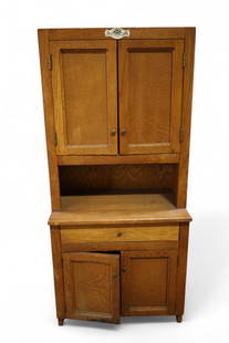 CHILDS KITCHEN CABINET: SMALL 4 DOOR OAK CHILDS HOOSIER KITCHEN CABINET, MINOR WEAR TO FINISH, SOME VENEER DAMAGE. 18" W x 11" D x 40" H. THIS ITEM EXCEEDS SIZE OR WEIGHT LIMITATIONS FOR IN HOUSE SHIPPING, MUST BE PICKED UP