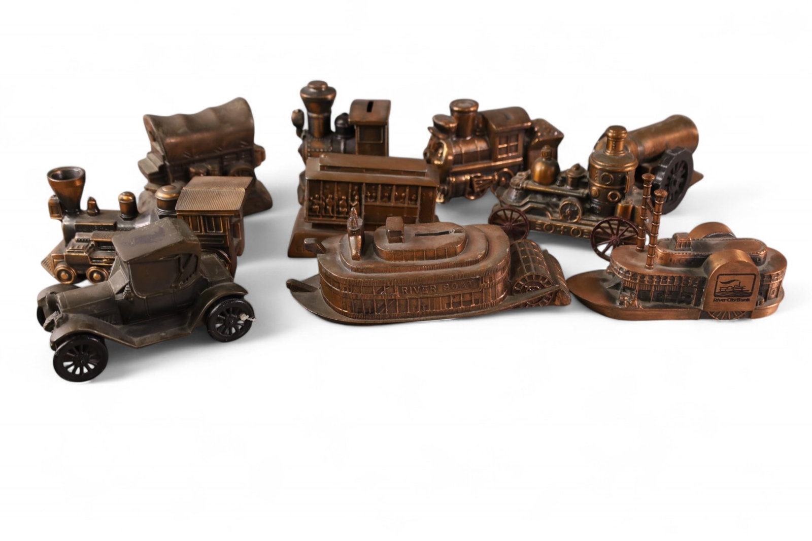 10 DIECAST STILL BANKS: 10 SMALL DIECAST STILL BANKS, BANTHRICO BANKS. BOATS, CARS, TRAINS. AND MORE.