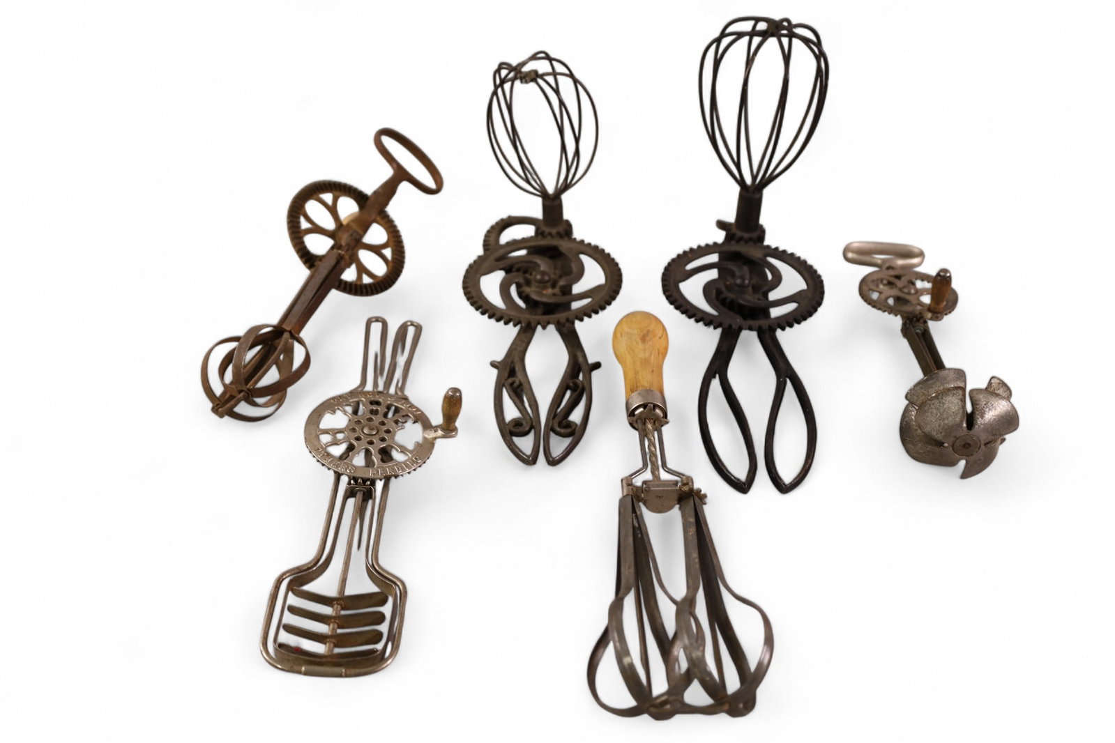 COLLECTION OF BEATERS: 6 PRIIMITIVE BEATERS OR MIXERS, PERFECTION, CAST IRON JAQUETTE, DOVER, AND MORE