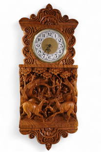BLACK FOREST STYLE WALL CLOCK: HIGHLY CARVED BLACK FOREST STYLE WALL CLOCK, CONTEMPORARY WALL CLOCK. CONVERTED TO BATTERY OP.
