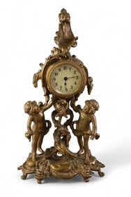 FIGURAL SHELF CLOCK