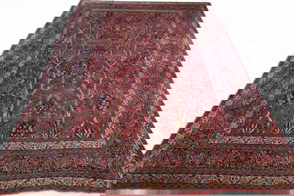 APPROX 16' 10" x 12' HANDMADE WOOL RUG.