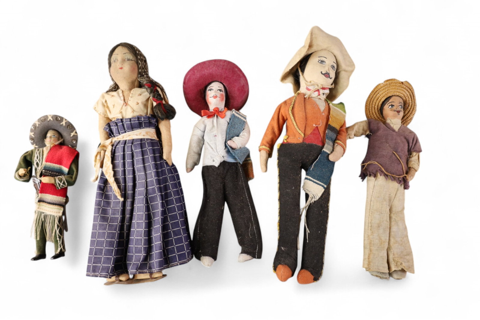 GROUPING OF MEXICAN DOLLS: GROUPING OF HANDMADE ANTIQUE MEXICAN FOLKART DOLLS.