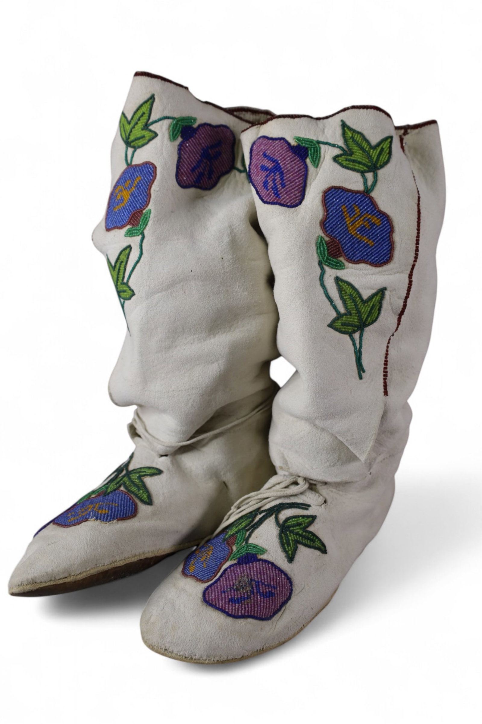 NATIVE AMERICAN MOCCASINS: LEATHER BEADED HANDMADE NATIVE AMERICAN MOCCASINS. 13" H.