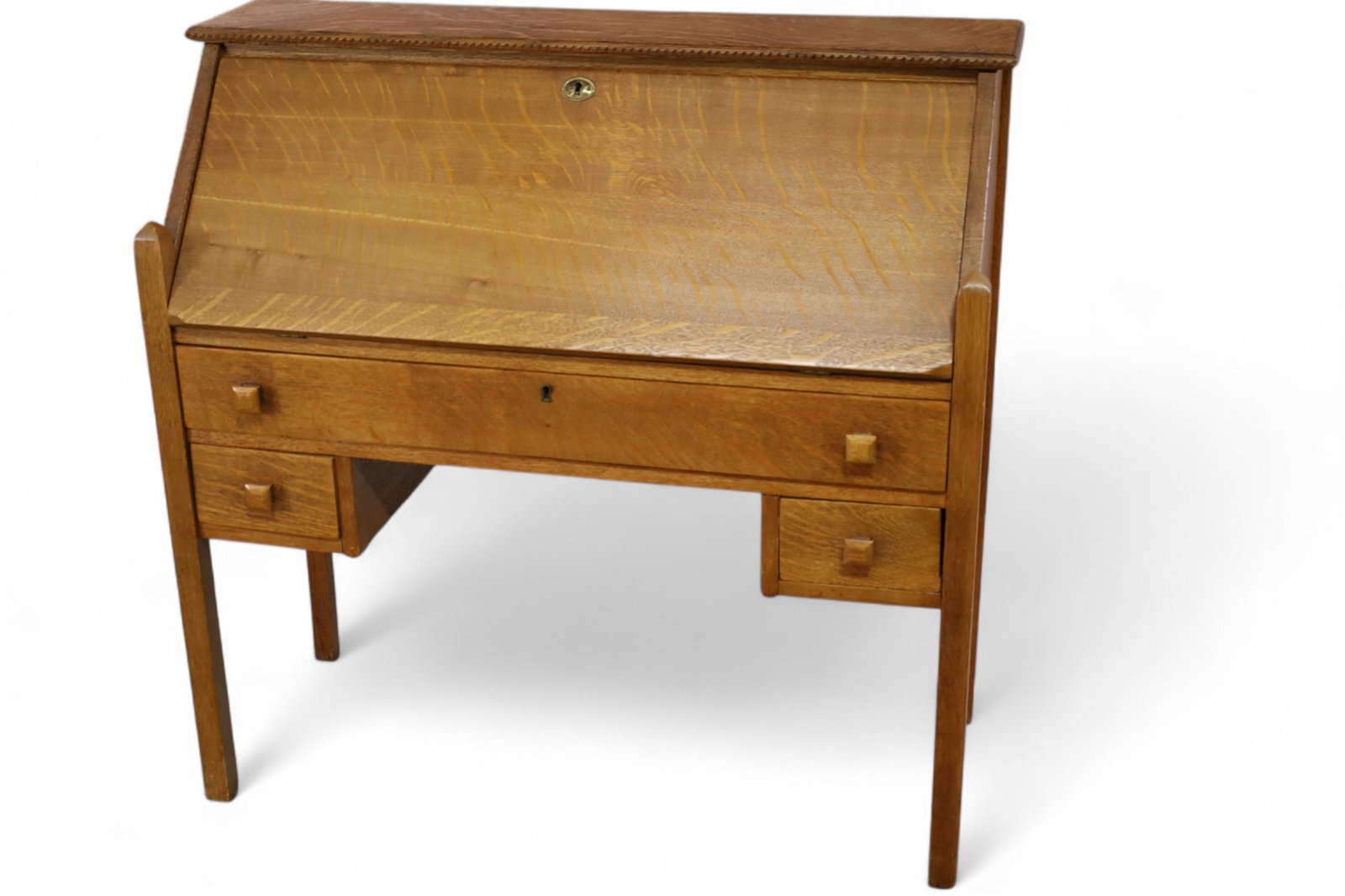 MISSION OAK DROP FRONT DESK: MISSION OAK ARTS & CRAFTS DROP FRONT DESK, LOWER DRAWERS, FITTED INTERIOR. MISSING INTERIOR DRAWERS. SOME STAINS TO FINISH ON INTERIOR. NO KEY. 37" W x 15" D x 37" H. THIS ITEM EXCEEDS SIZE LIMITATION