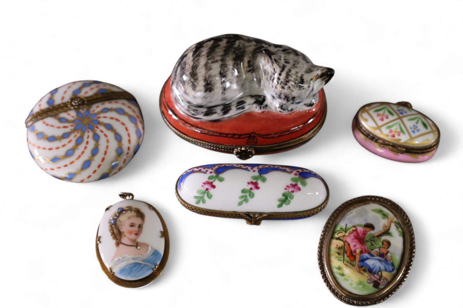 PORCELAIN PILL BOXES & BROACHES: LIMOGES PORCELAIN PILL BOXES & PORCELAIN BROACHES. 1 1/2" - 3" L.