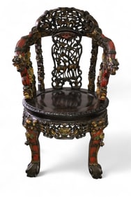 HIGHLY CARVED ASIAN ARMCHAIR