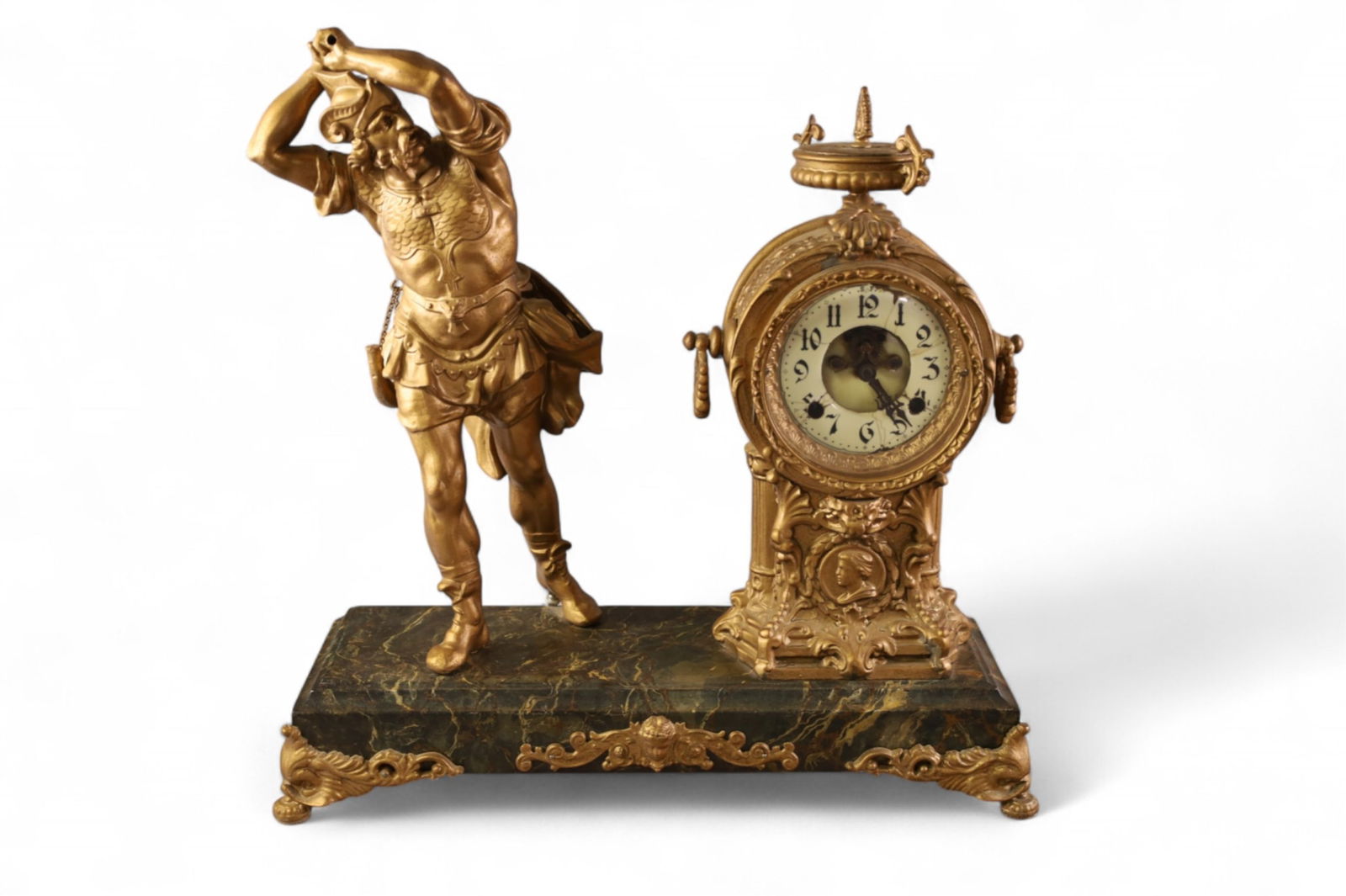 LARGE ANSONIA FIGURAL MANTLE CLOCK: LARGE PAINTED SPELTER FIGURAL MANTLE CLOCK, DAMAGE TO DIAL, MISSING BACK. REPAINTED. WITH PENDULUM. ALL CLOCKS ARE SOLD AS IS WE DO NOT GUARANTEE WORKING ORDER. 20" W x 19" H. THIS ITEM EXCEEDS SIZE L