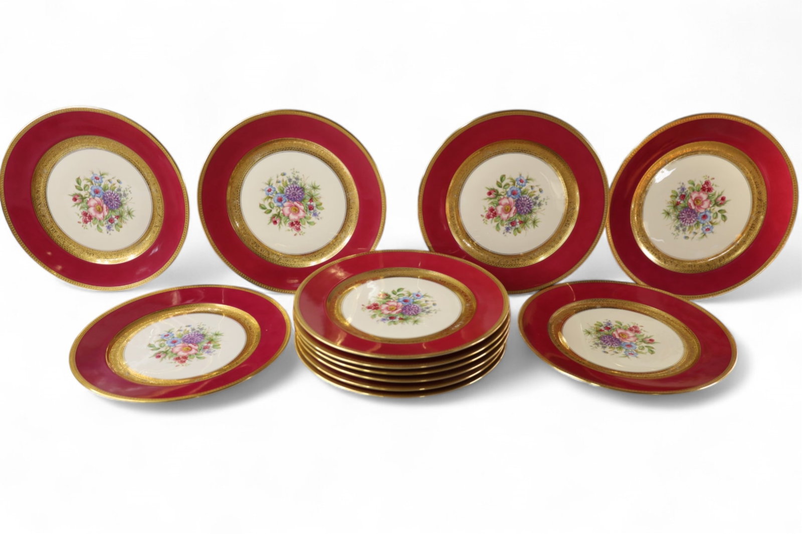 SET OF 12 ROSENTHAL IVORY DINNER PLATES: PORCELAIN ROSENTHAL IVORY DINNER PLATES, MINOR WEAR TO GOLD RIM. 10 1/2" DIAM.