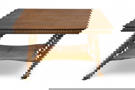 1900'S AM. OAK LIBRARY TABLE: AMERICAN OAK TWO TIER TABLE, GLASS BALL FEET. MINOR WEAR TO FINISH. DAMAGE TO CORNER. 42" L x 28" W x 29" H. THIS ITEM EXCEEDS SIZE LIMITATIONS FOR IN HOUSE SHIPPING, MUST BE PICKED UP IN HOUSE OR SHI
