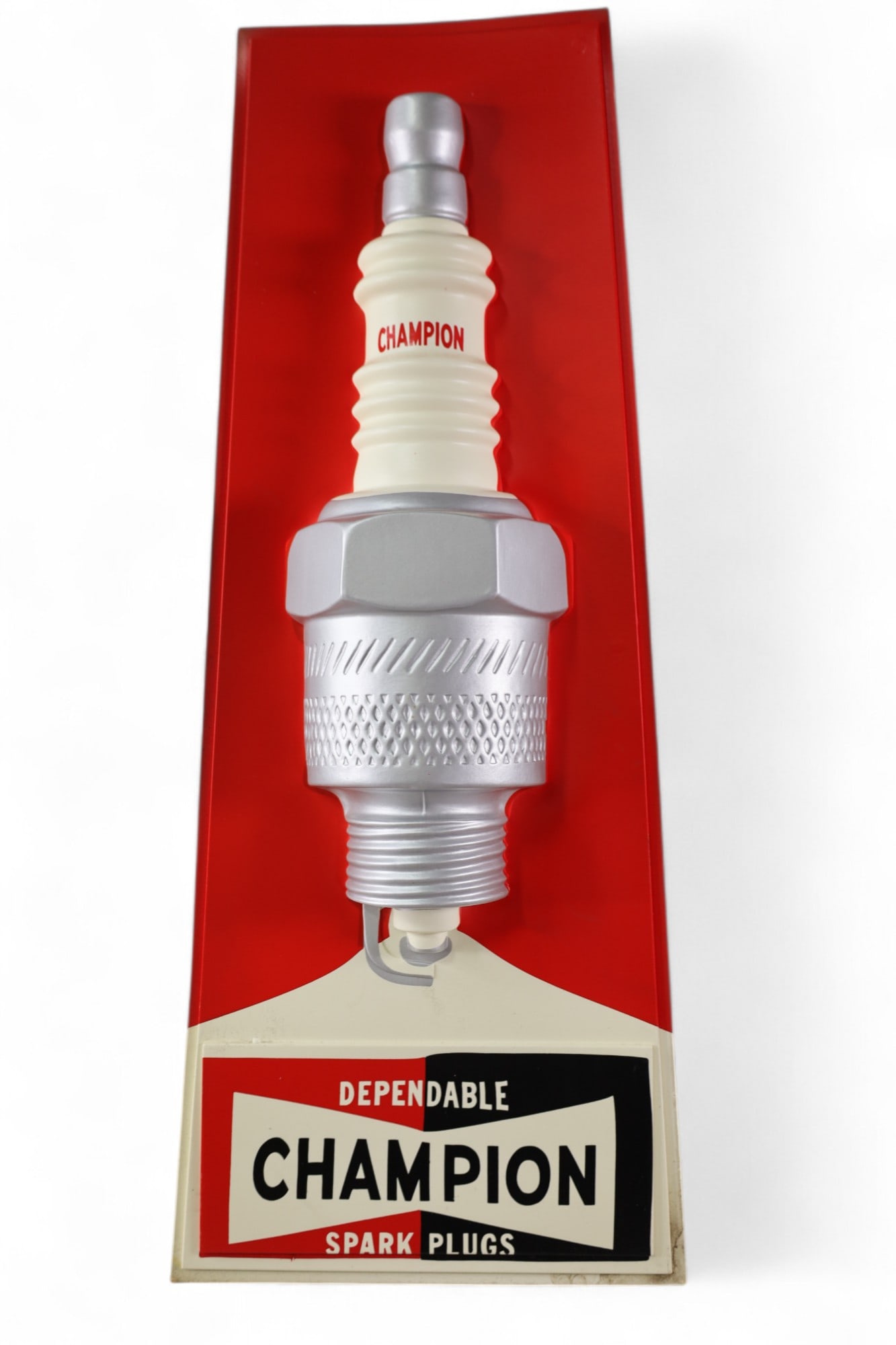 11 CHAMPION SPARK PLUG SIGNS: PLASTIC CHAMPION SPARK PLUG SIGNS, 25" x 10"