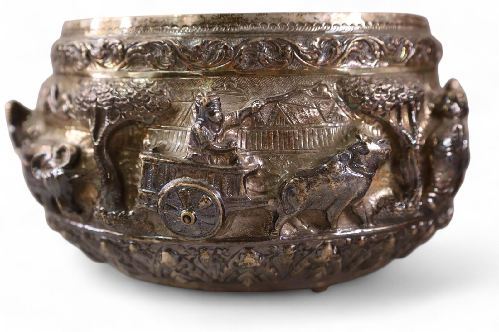 ASIAN SILVER CENTER BOWL: DESIGNED IN RELIEF, ASIAN SILVER CENTER BOWL, UNMARKED BUT TESTED. APPROX 603 GRAMS 7-1/2"W X 4-3/4"H