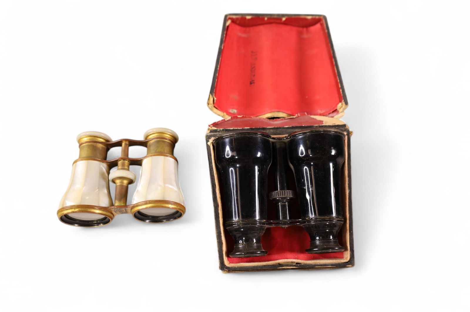 2 PAIRS OF OPERA GLASSES: MOTHER OF PEARL & BLACK IN CASE. BOTH HAVE DAMAGE.