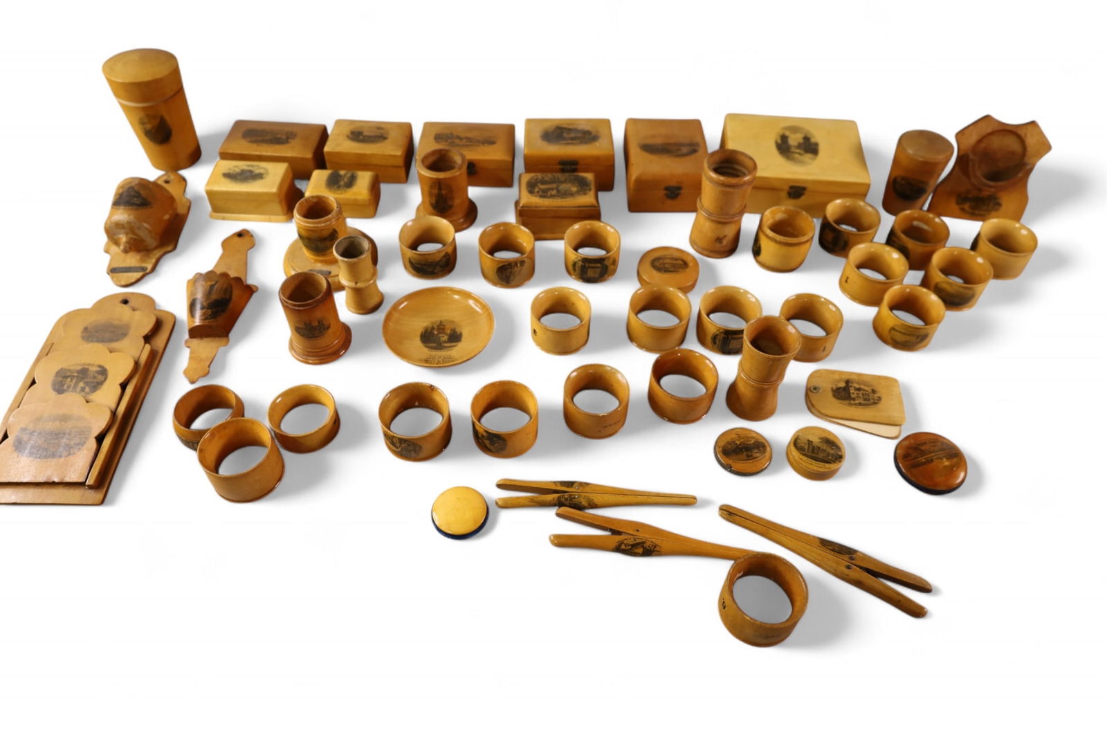 LARGE COLLECTION OF TREEN SOUVENIR ITEMS: OVER 50 19TH CENTURY NAPKIN RINGS, BOXES, AND MORE.