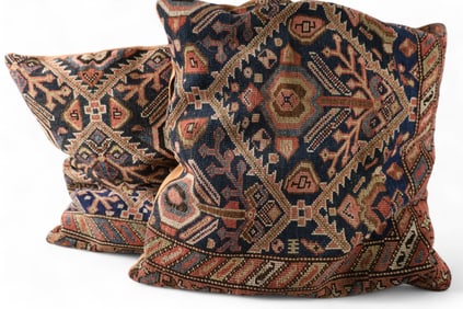 2 RUG PILLOWS