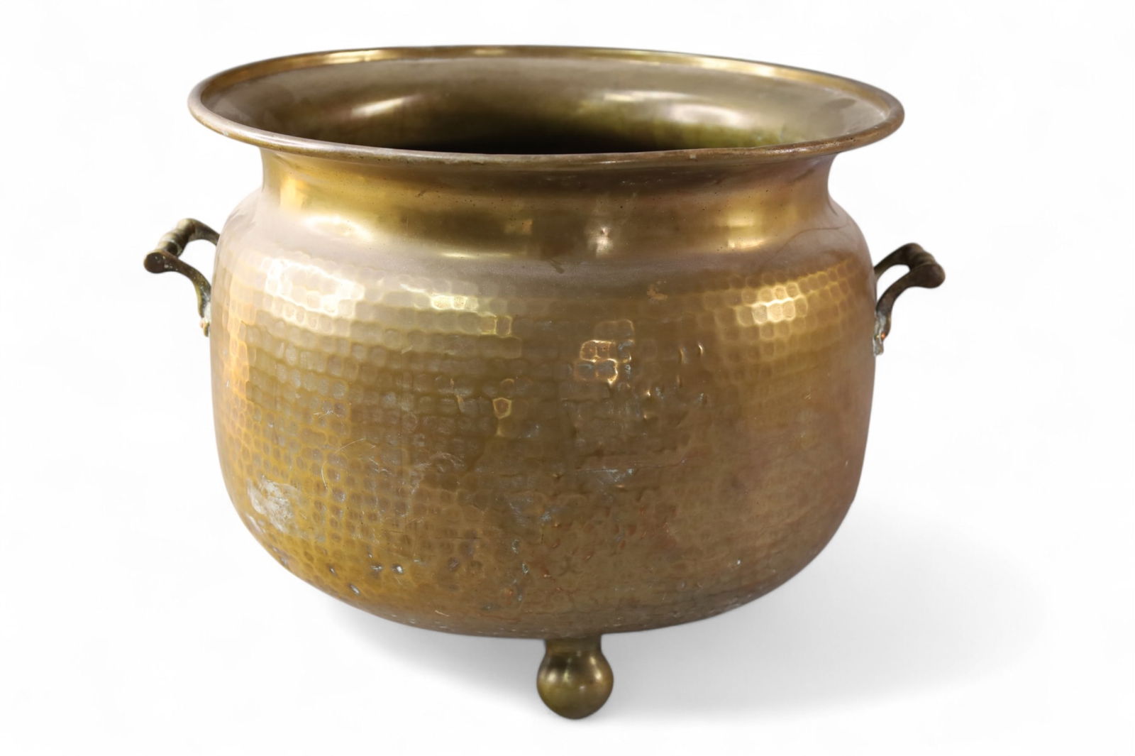 FOOTED BRASS JARDINIERE: LARGE FOOTED BRASS JARDINIERE, POUNDED BRASS. MARKED FARBER NEW YORK. 15 1/2" DIAM x 12" H.