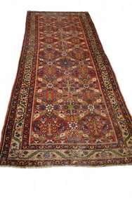 APPROX 10' 4" x 4' 3" HANDMADE WOOL RUG
