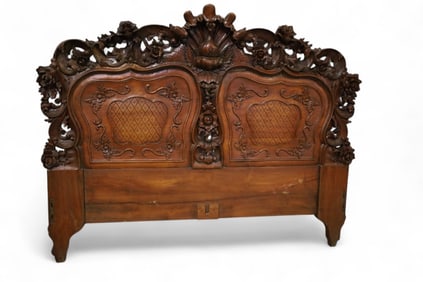 HIGHLY CARVED MAHOGANY BED (NO RAILS)