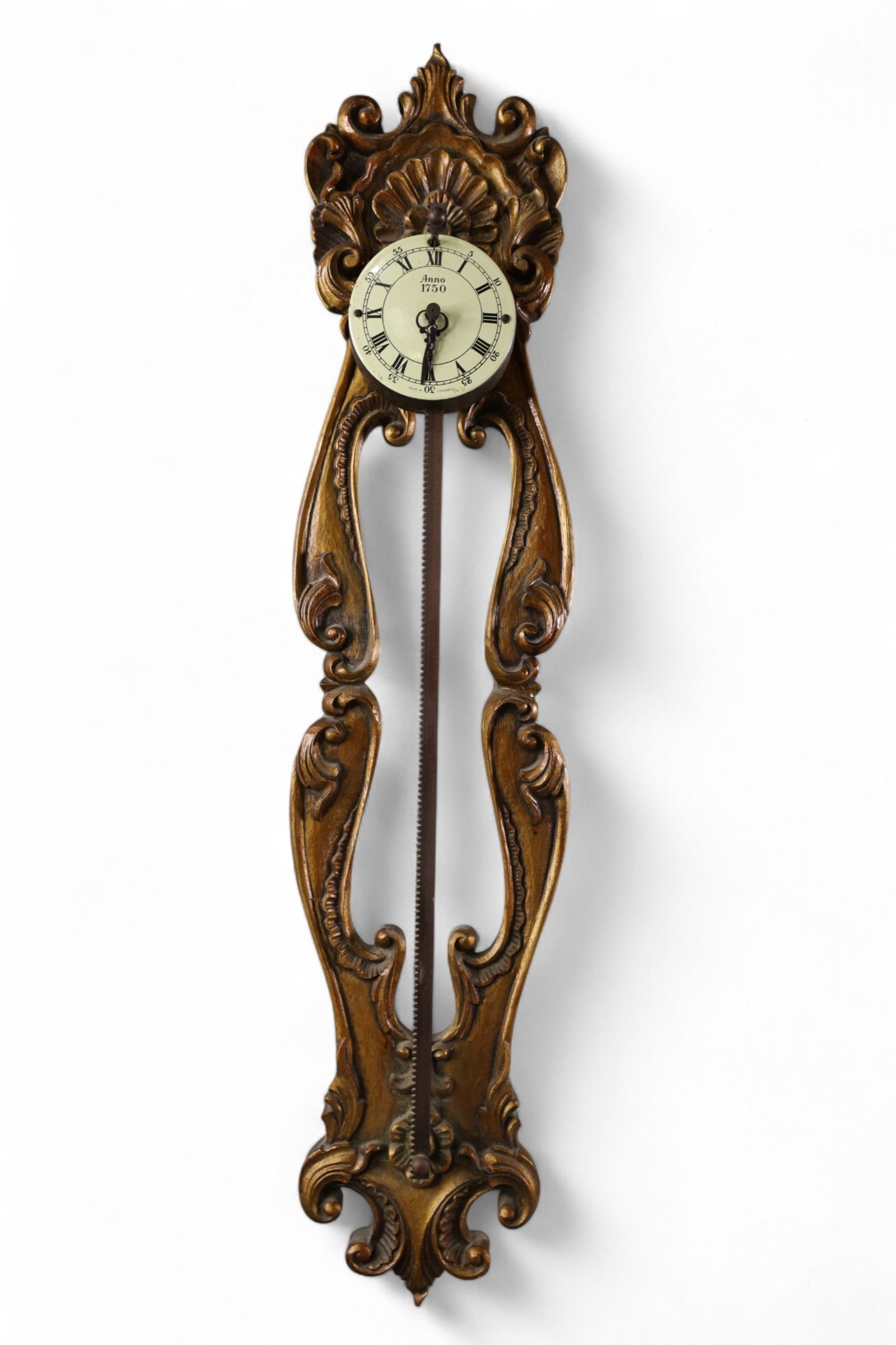 GERMAN GRAVITY CLOCK: GILT WOOD ANNO 1750 GERMAN GRAVITY SAW TOOTH CLOCK, ALL CLOCKS ARE SOLD AS IS WE DO NOT GUARANTEE WORKING ORDER. 26" H.