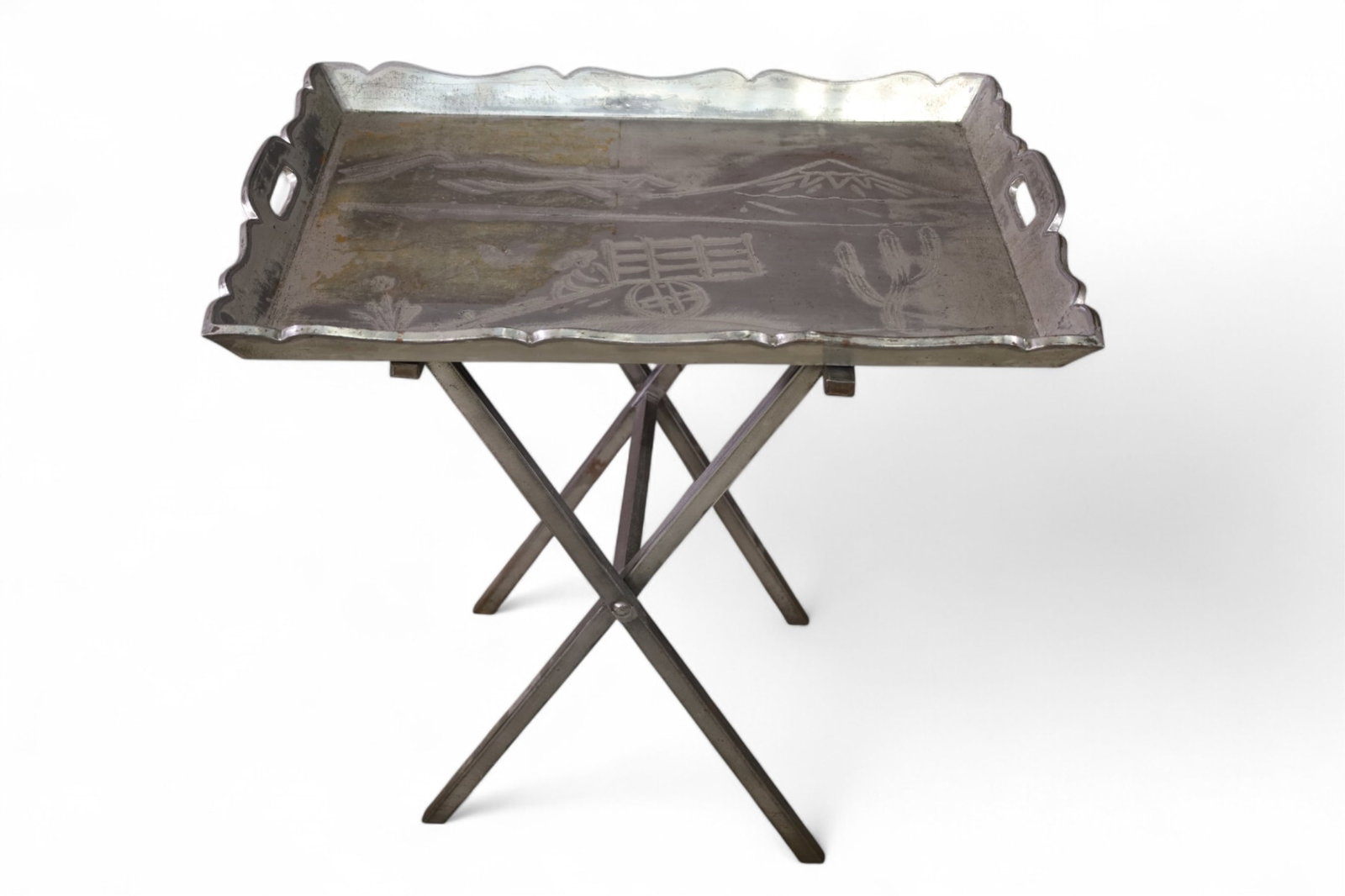 MEXICAN TRAY ON STAND: SERVING TRAY ON STAND, MEXICAN TRAY. 26" W x 18" D x 25" H. DISCOLORATION TO TRAY. THIS ITEM EXCEEDS SIZE LIMITATIONS FOR IN HOUSE SHIPPING, MUST BE PICKED UP IN HOUSE OR SHIPPED VIA 3rd PARTY GROUND 