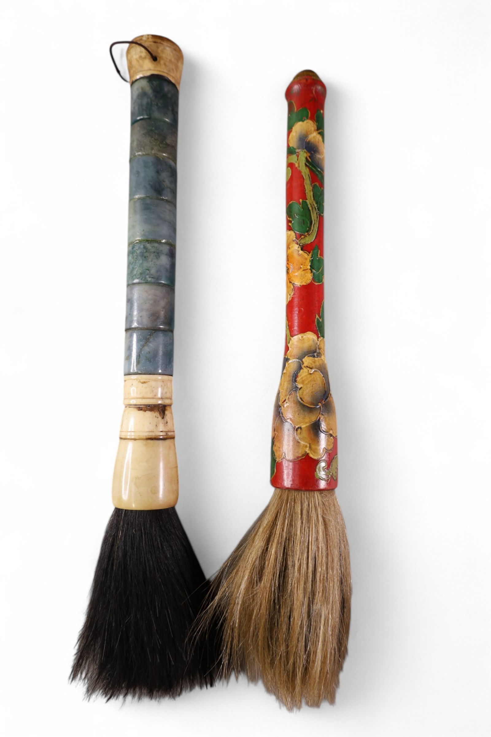 2 CHINESE CALLIGRAPHY BRUSHES: BONE AND STONE, AND PAINTED HANDLES, HORSE HAIR BRUSHES.