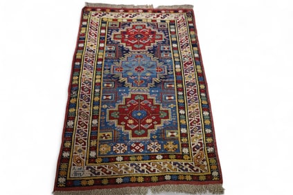 APPROX 4' 8" x 2' 10" HANDMADE WOOL RUG