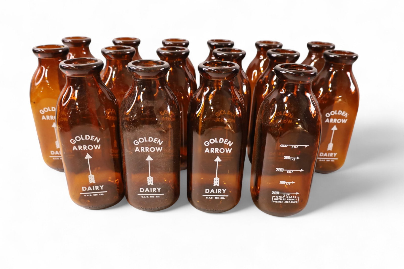16 MILK BOTTLES: 16 GOLDEN ARROW DAIRY BOTTLES, 1 QUART