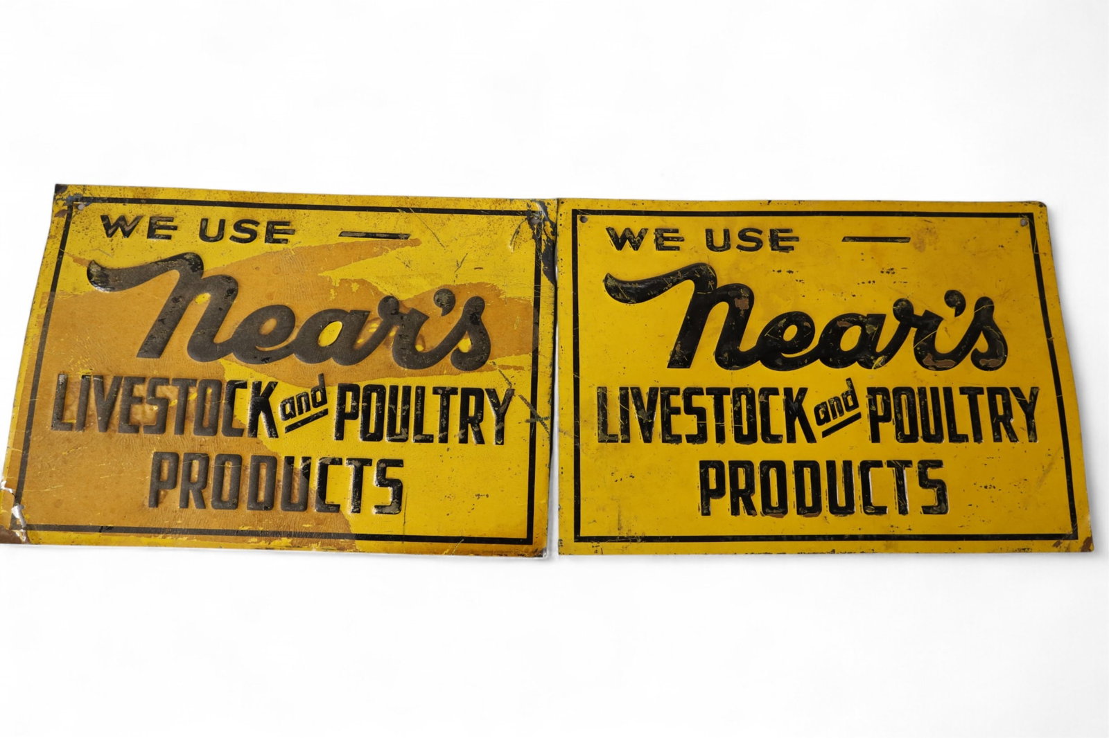 2 LIVESTOCK SIGNS: LIVESTOCK AND POULTRY PRODUCTS, SCRATCHES AND PAINT LOSS. 14" x 10"