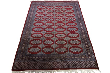 APPROX 6' 10" x 5' HANDMADE WOOL RUG