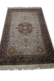 APPROX 7' x 4' 7" HANDMADE WOOL RUG