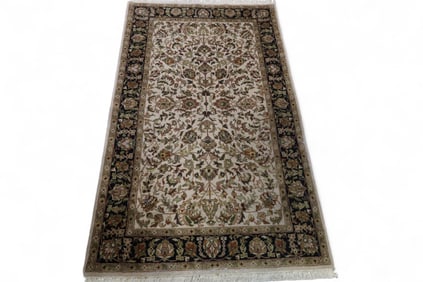 APPROX 5' 6" x 3' 4" HANDMADE WOOL RUG