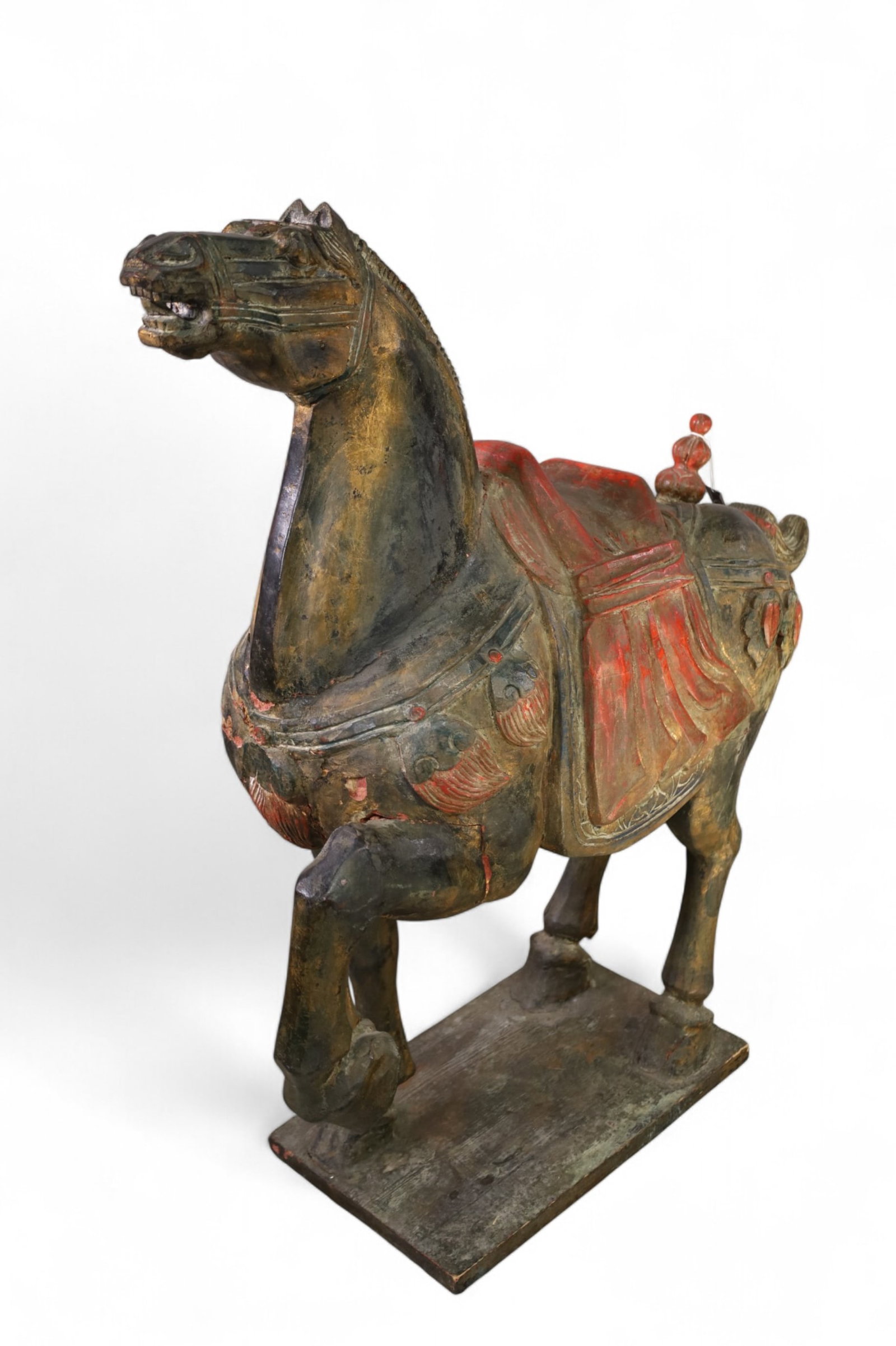 CARVED WOODEN TANG STYLE HORSE: FROM THE ESTATE OF ELIZABETH TAYLOR, SOLD BY JULIENS AUCTION, DEC 2019. LARGE WOODEN CARVED HORSE, 40" H. THIS ITEM EXCEEDS SIZE LIMITATIONS FOR IN HOUSE SHIPPING, MUST BE PICKED UP IN HOUSE OR SHIPPE