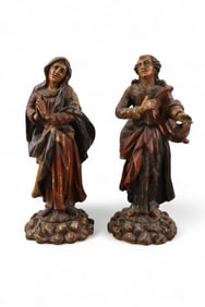 2 WOODEN SANTOS