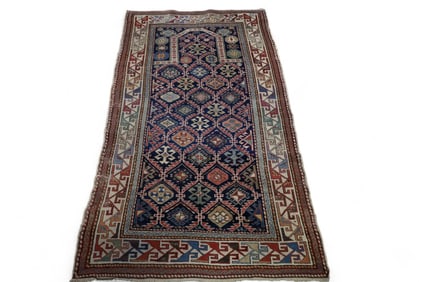 APPROX 3' 2" x 5' 8" HANDMADE WOOL RUG