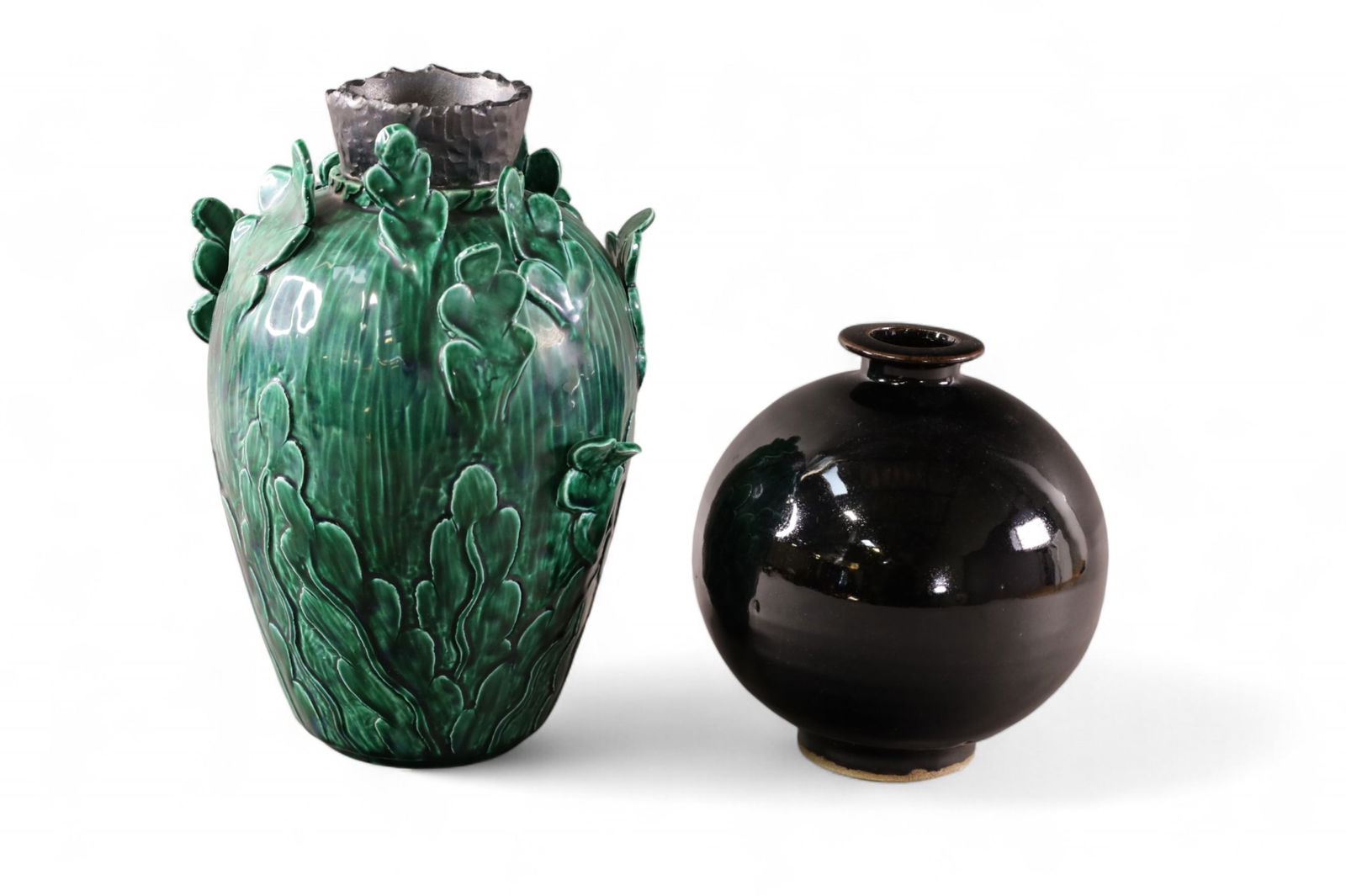 2 PIECES OF CHINESE POTTERY: GREEN VASE WITH FLORAL DECORATION & BLACK VASE. 7" - 10 1/2" H