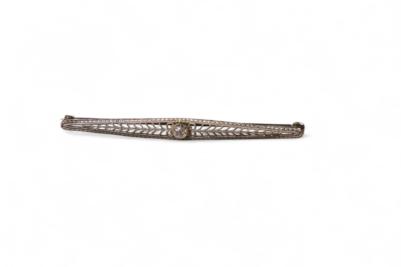 DECO 14K BAR PIN: 14K GOLD AND DIAMOND DECO BAR PIN. APPROX 2.7 GRAMS.