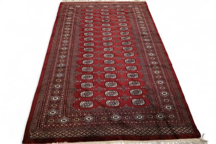 APPROX 7' 8" x 5' HANDMADE WOOL RUG