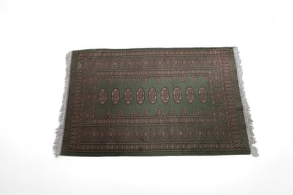 APPROX 4' x 2' 8" HANDMADE WOOL RUG