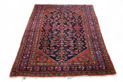 APPROX 6' 4" x 4' 7" HANDMADE WOOL RUG