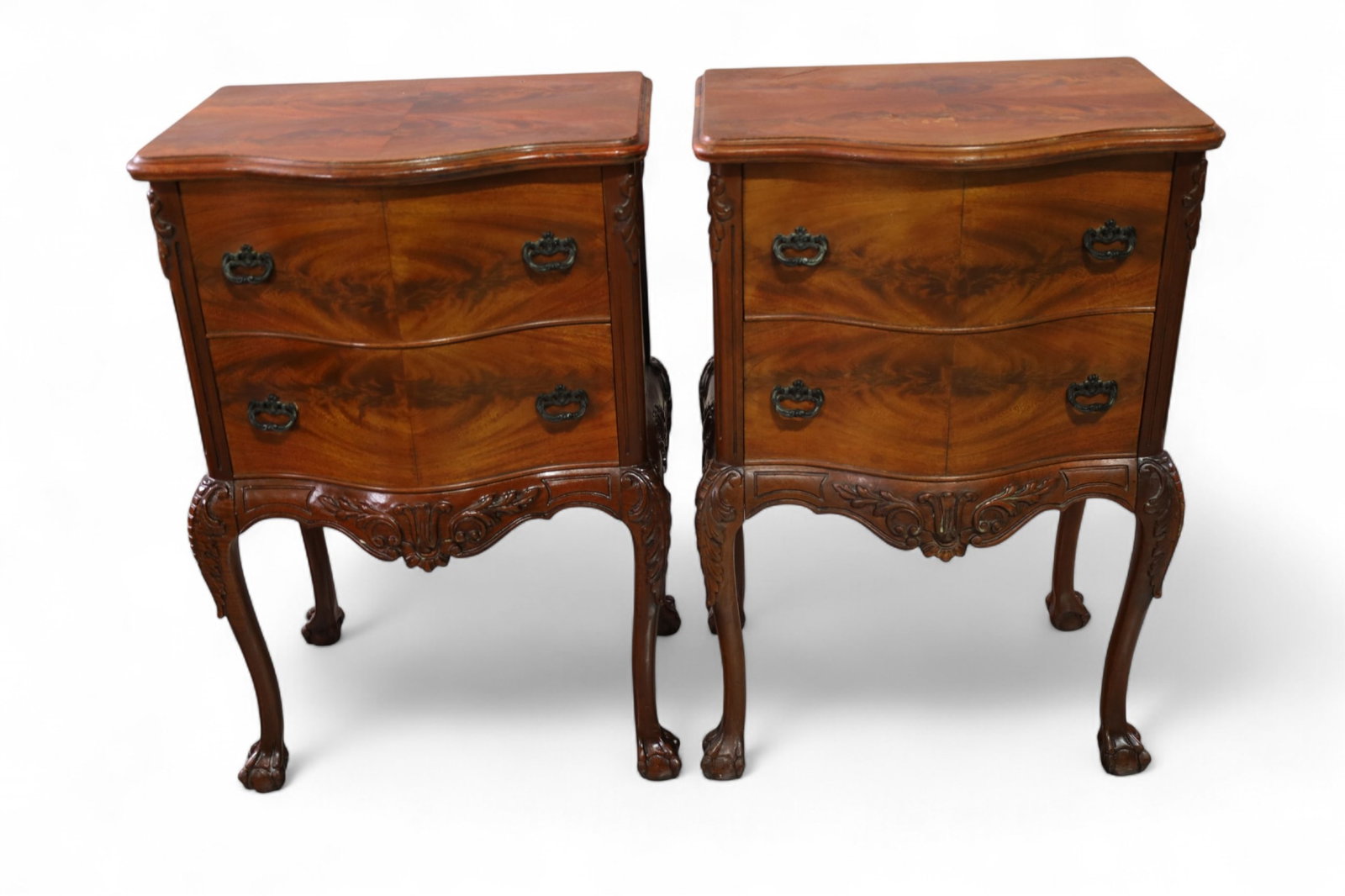 PAIR OF MAHOGANY NIGHTSTANDS: PAIR OF BALL AND CLAW, FLAME MAHOGANY NIGHTSTANDS, WEAR TO FINISH. 19" W x 14" D x 28" H. THIS ITEM EXCEEDS SIZE LIMITATIONS FOR IN HOUSE SHIPPING, MUST BE PICKED UP IN HOUSE OR SHIPPED VIA 3rd PARTY 
