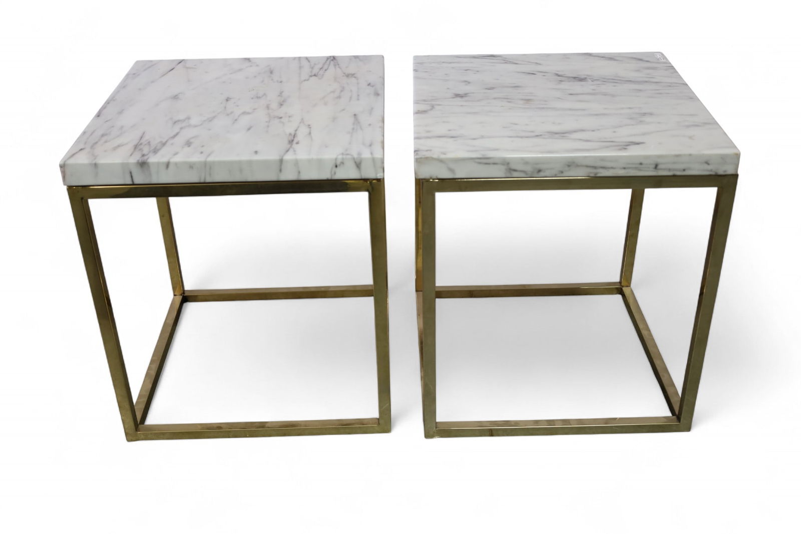 PAIR OF BRASS AND MARBLE END TABLES: PAIR OF BRASS AND MARBLE END TABLES, ATTRIBUTED TO MILO BAUGHMAN, 18" x 18" x 20" H. . THIS ITEM EXCEEDS SIZE LIMITATIONS FOR IN HOUSE SHIPPING, MUST BE PICKED UP IN HOUSE OR SHIPPED VIA 3rd PARTY GRO