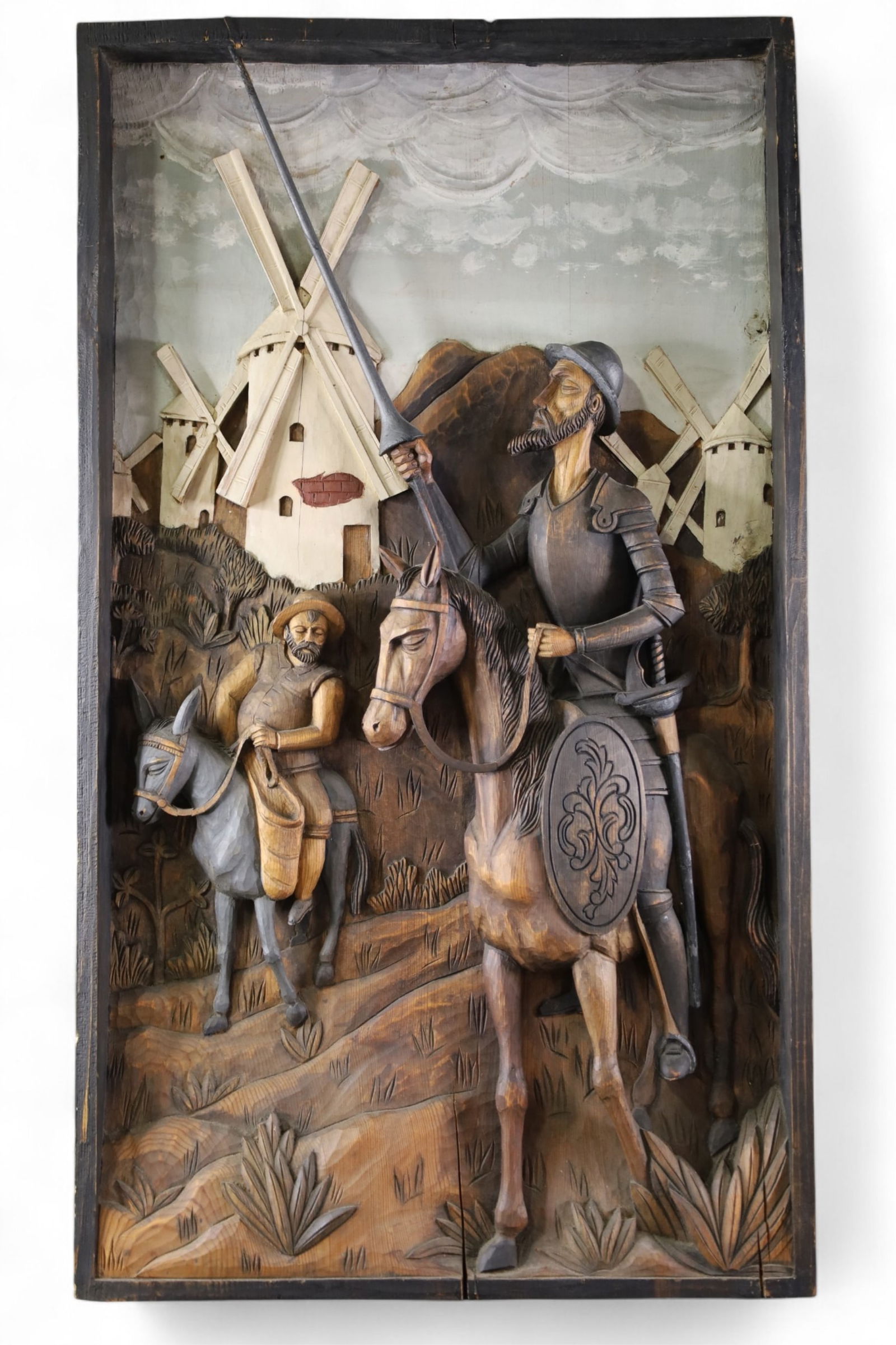 DON QUIXOTE WOODEN CARVING: LARGE WOODEN CARVED WALL HANGING OF DON QUIXOTE, 22" x 39" . THIS ITEM EXCEEDS SIZE LIMITATIONS FOR IN HOUSE SHIPPING, MUST BE PICKED UP IN HOUSE OR SHIPPED VIA 3rd PARTY GROUND SHIPPER.