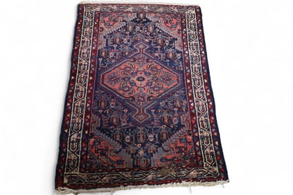 APPROX 3' 11" x 2' 9" HANDMADE WOOL RUG