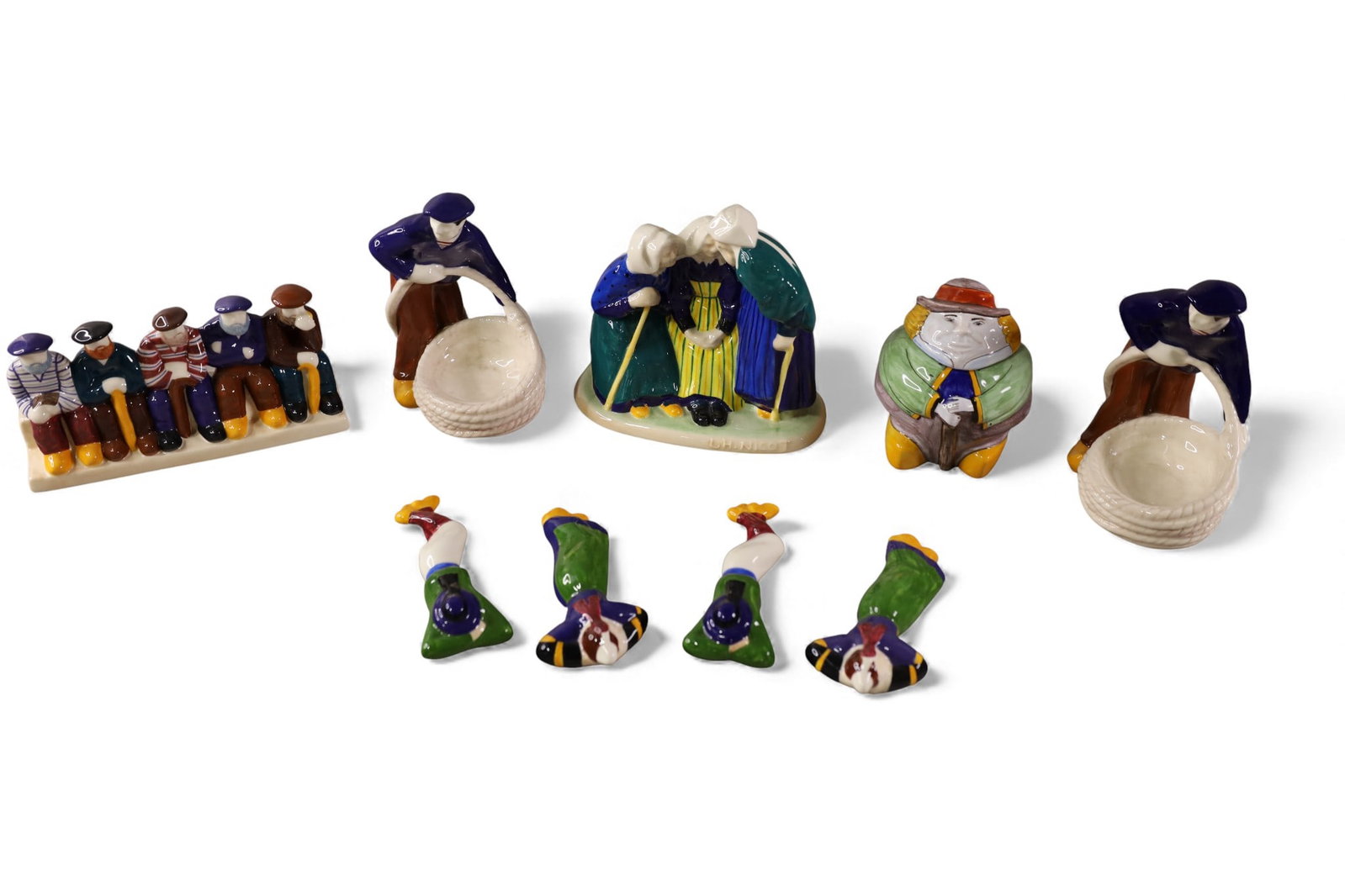 GROUPING OF QUIMPER FIGURES: GROUPING OF SMALL QUIMPER FIGURES, 9 PIECES TOTAL. SOME ARTIST SIGNED, RAVALLEC. 3 1/2" - 6 "H.