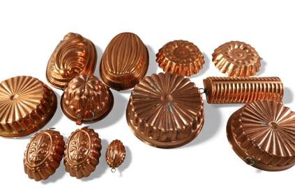 COLLECTION OF COPPER MOLDS AND PANS