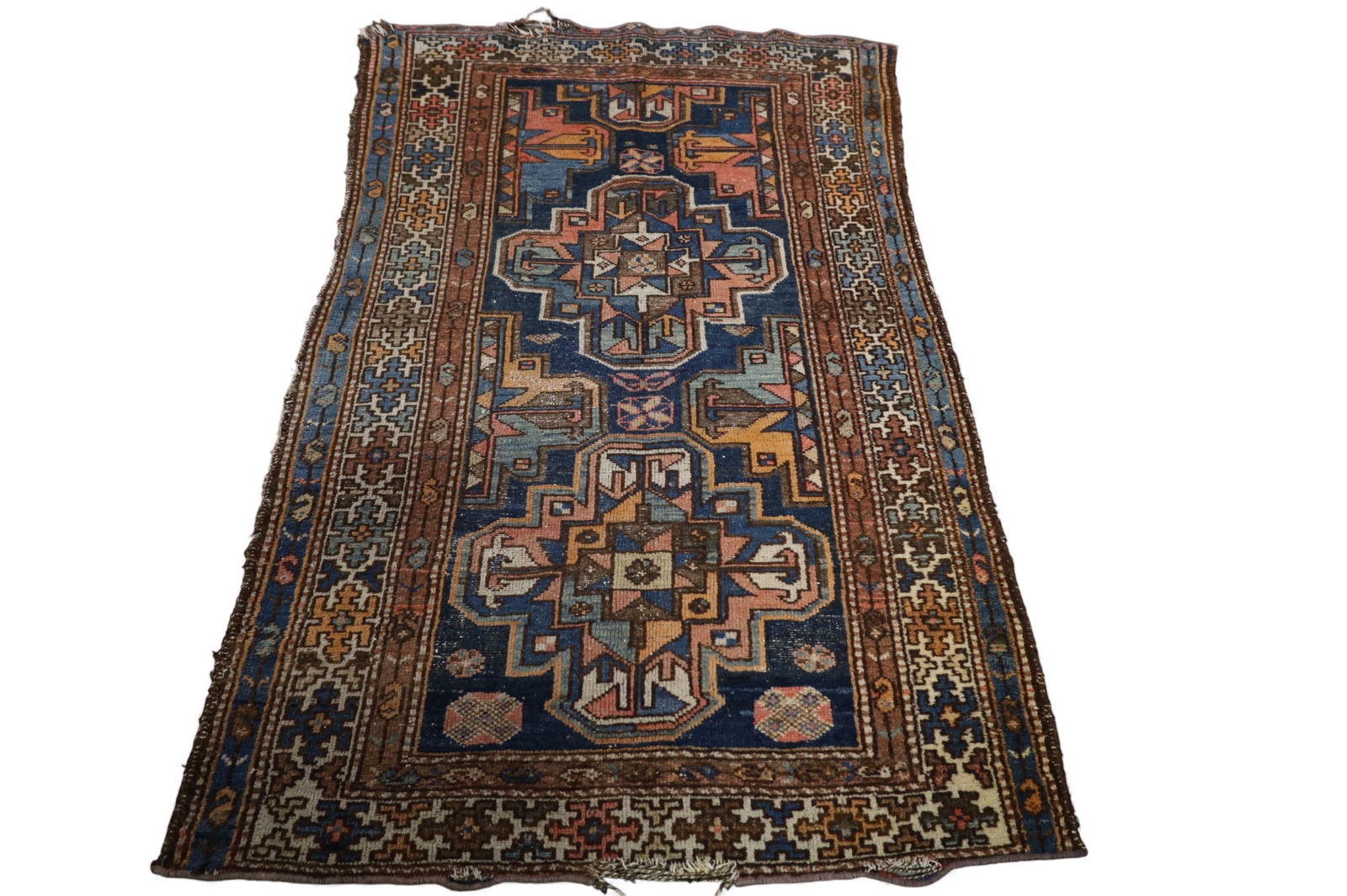 APPROX 3' 6" x 5' 6" HANDMADE WOOL RUG: ANTIQUE WOOL RUG, END LOSS.