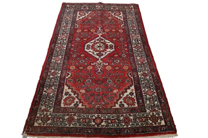 APPROX 6' 10" x 4' 1' HANDMADE WOOL RUG