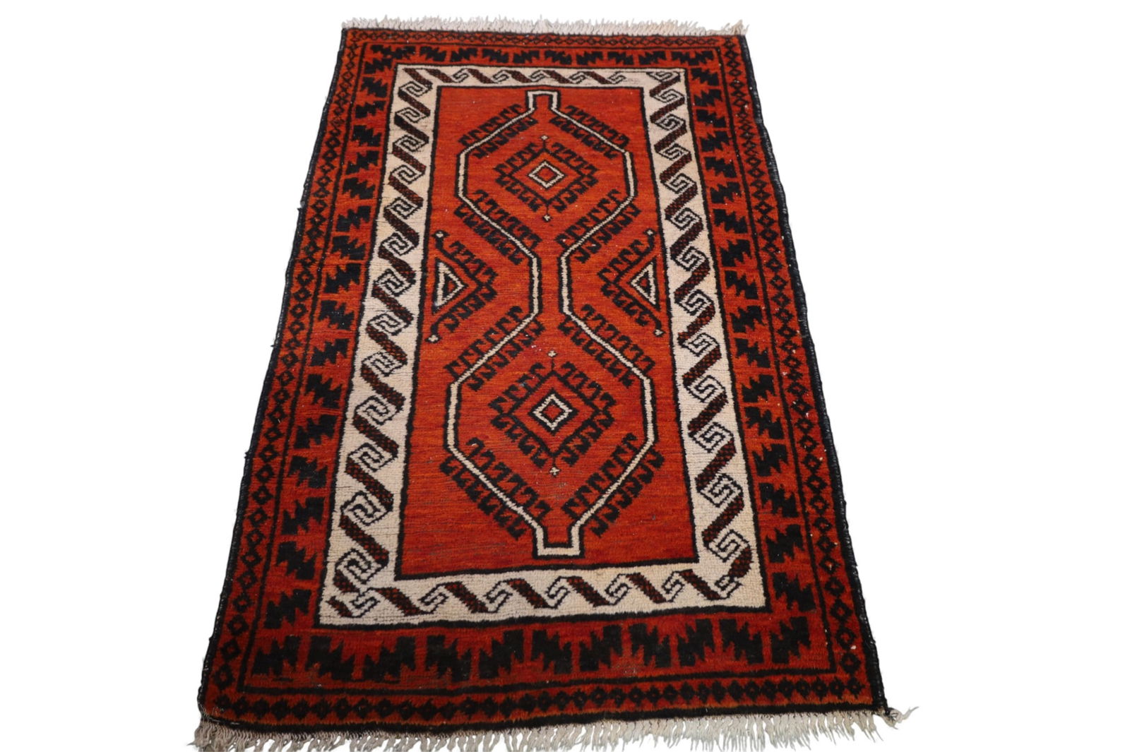 APPROX 4' 11" x 3' HANDMADE WOOL RUG: HANDMADE WOOL RUG.